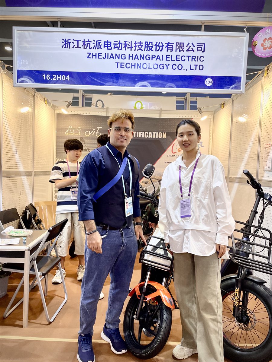 Hidayat Khan meeting a supplier at Zhejiang Hangpai Electric Technology booth 16.2H04 during the Canton Fair 139th session